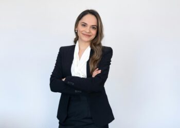 a woman in a black suit